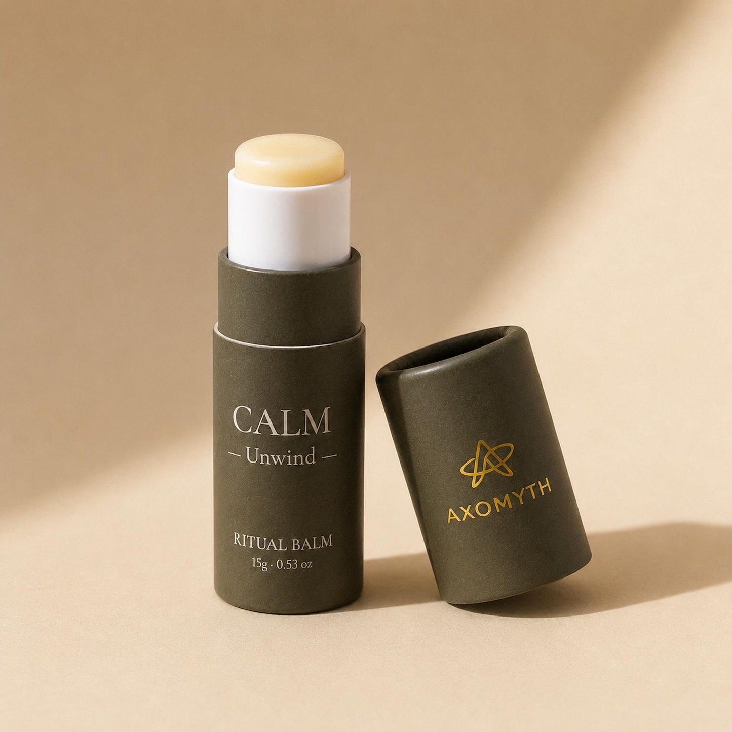 AXOMYTH CALM ritual balm, cap removed, balm visible on the push-up mechanism