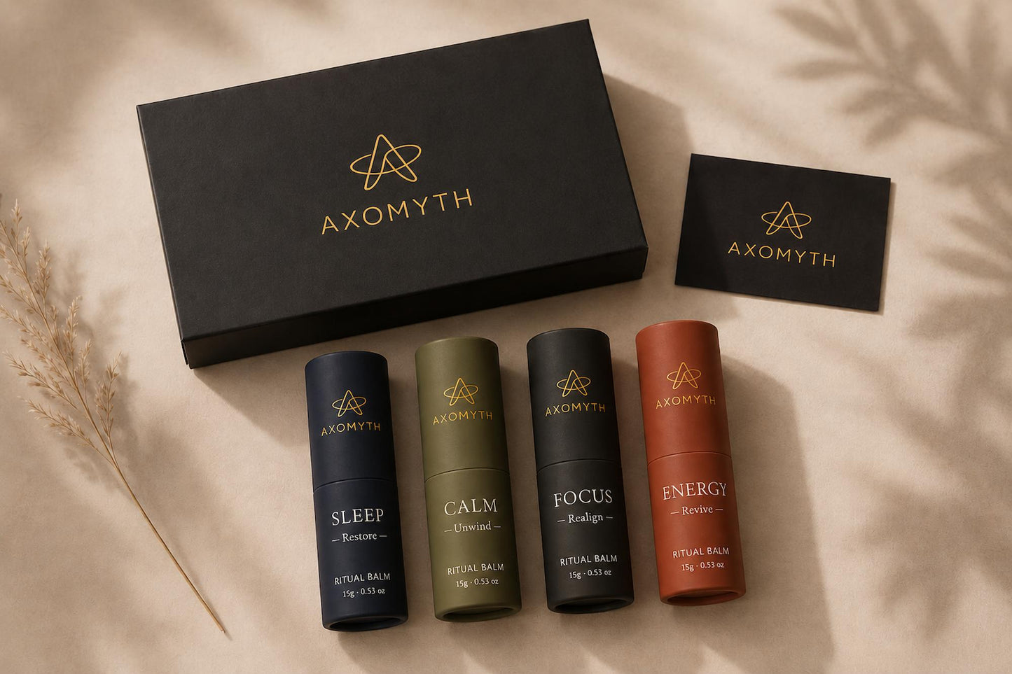 AXOMYTH Complete Ritual Set box open, showing all four ritual balms and signature card