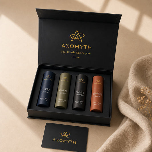 AXOMYTH Complete Ritual Set box open, showing all four ritual balms and signature card
